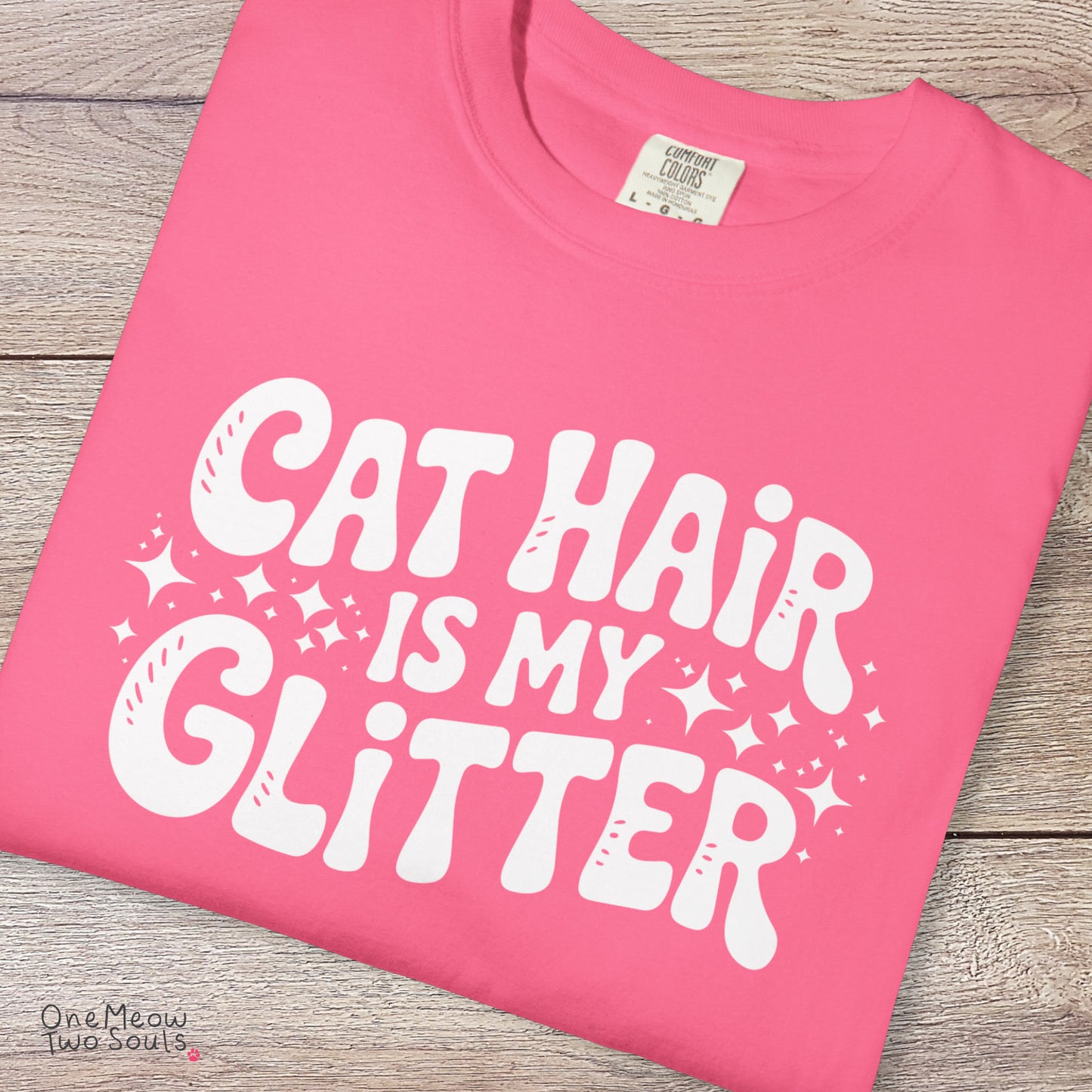 Crunchberry colored Comfort Colors 1717 cotton T-shirt, featuring a "Cat Hair Is My Glitter" funny cat design illustration. One Meow Two Souls brand.