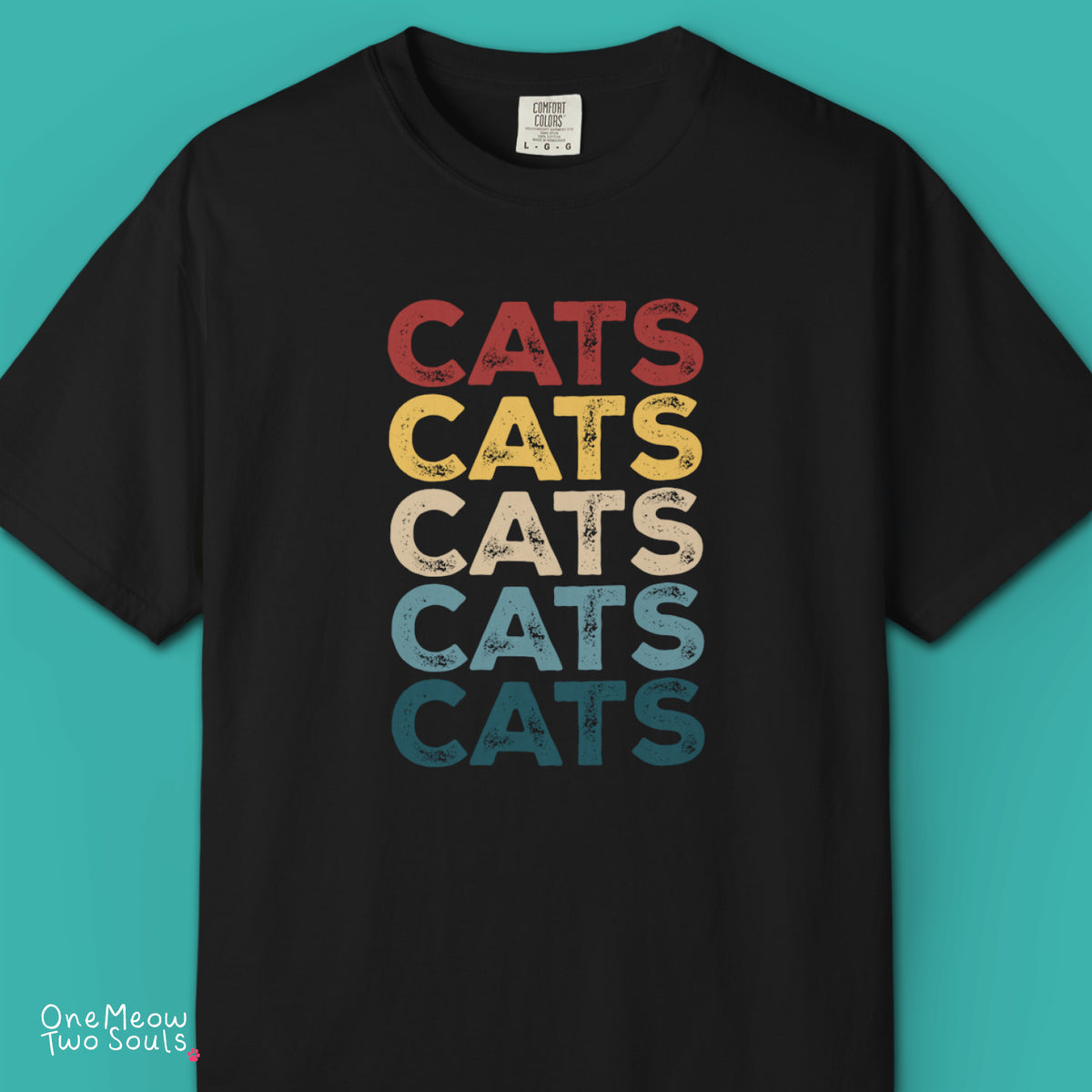 Black colored Comfort Colors 1717 cotton T-shirt, featuring a retro "CATS" cool cat design illustration. One Meow Two Souls brand.