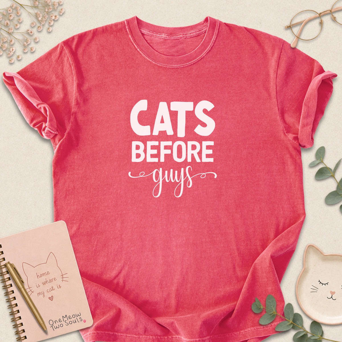Watermelon colored Comfort Colors 1717 cotton T-shirt, featuring a "Cats Before Guys" funny cat design illustration. One Meow Two Souls brand.