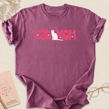 Berry colored Comfort Colors 1717 cotton T-shirt, featuring a "Cat Mom" cute cat design illustration. One Meow Two Souls brand.