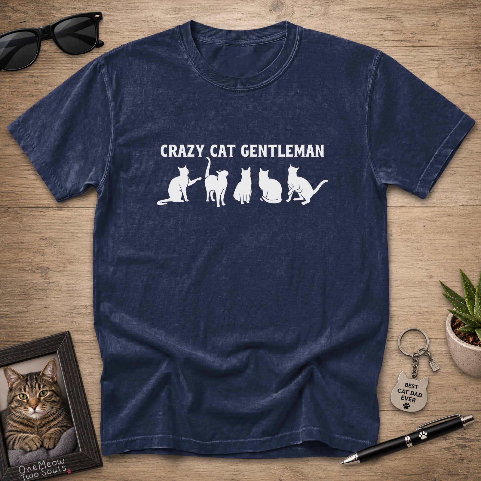 Navy Comfort Colors 1717 Crazy Cat Gentleman graphic T-shirt with white cat silhouettes.