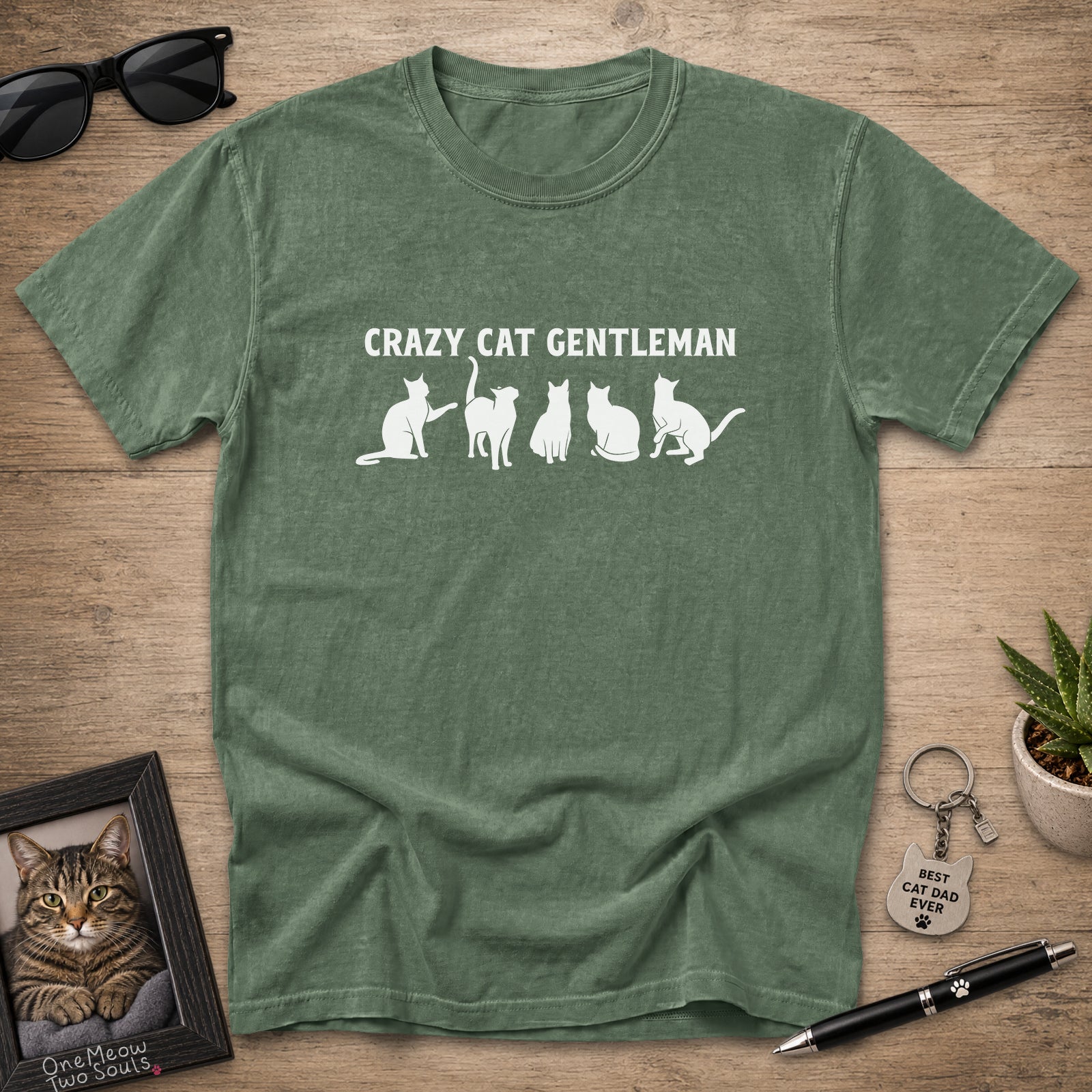 Moss Comfort Colors 1717 Crazy Cat Gentleman graphic T-shirt with white cat silhouettes.