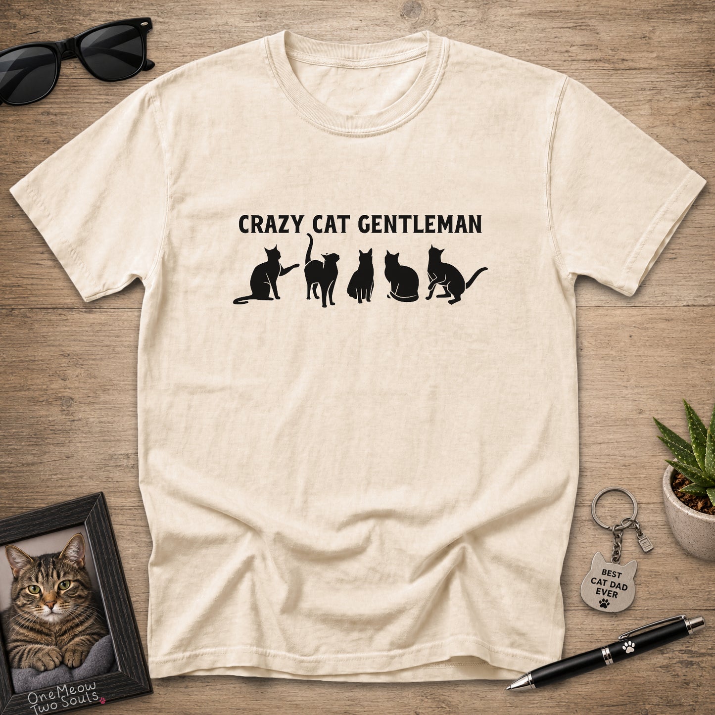 Ivory Comfort Colors 1717 Crazy Cat Gentleman graphic T-shirt with white cat silhouettes.
