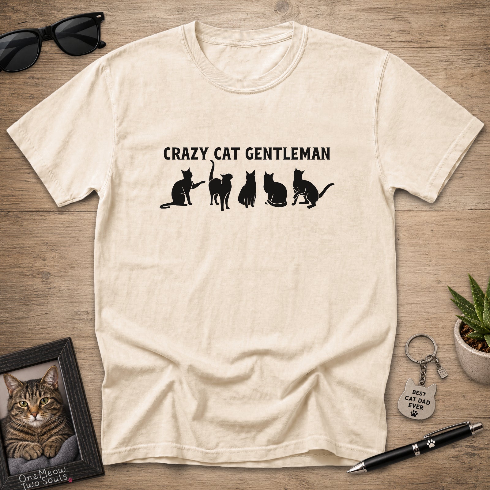 Ivory Comfort Colors 1717 Crazy Cat Gentleman graphic T-shirt with white cat silhouettes.
