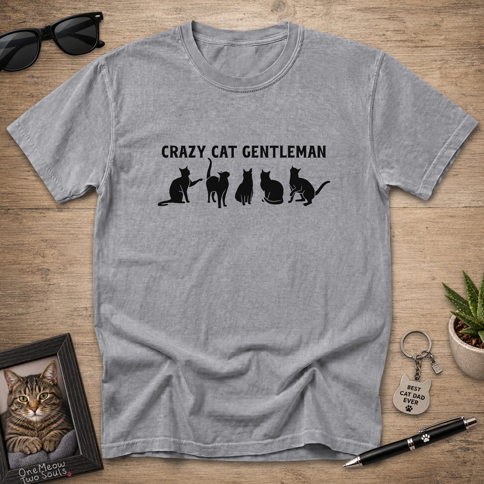 Grey Comfort Colors 1717 Crazy Cat Gentleman graphic T-shirt with white cat silhouettes.