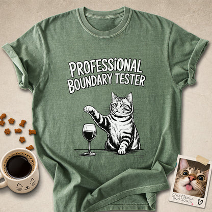 Moss colored Comfort Colors 1717 cotton T-shirt, featuring a "Professional Boundry Tester" funny cat design illustration. One Meow Two Souls brand.