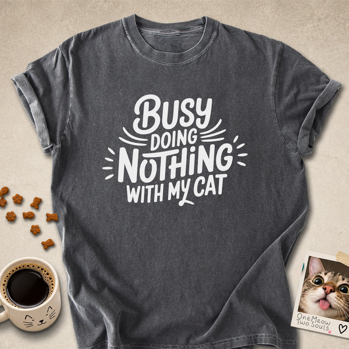 Pepper colored Comfort Colors 1717 cotton T-shirt, featuring a "Busy doing nothing with my cat" funny cat design illustration. One Meow Two Souls brand.