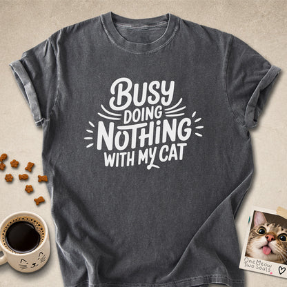 Pepper colored Comfort Colors 1717 cotton T-shirt, featuring a "Busy doing nothing with my cat" funny cat design illustration. One Meow Two Souls brand.