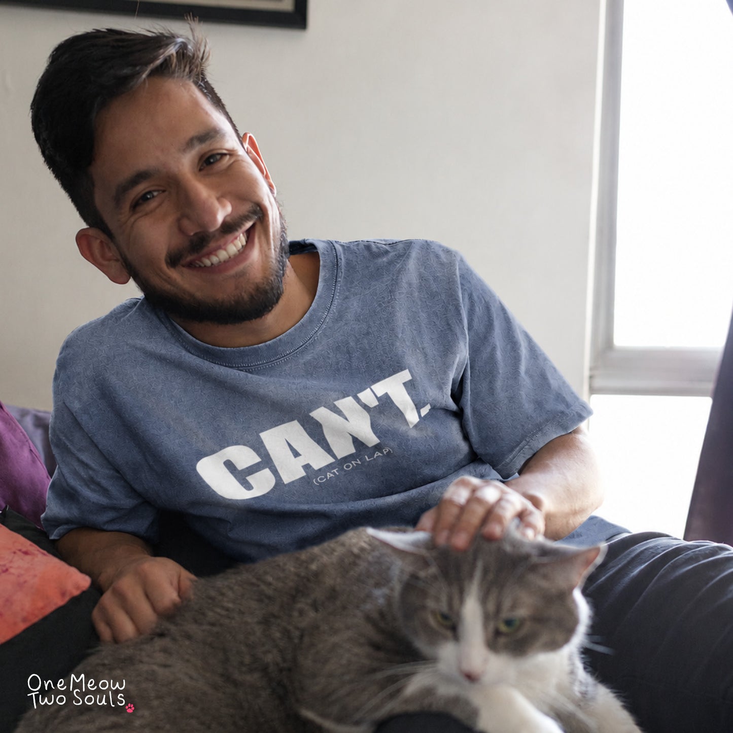 Blue Jean colored Comfort Colors 1717 cotton T-shirt, featuring a "Can't. (cat on lap)" funny cat design illustration. One Meow Two Souls brand.