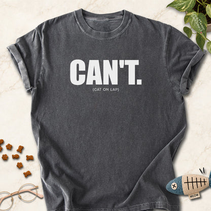 Pepper colored Comfort Colors 1717 cotton T-shirt, featuring a "Can't. (cat on lap)" funny cat design illustration. One Meow Two Souls brand.