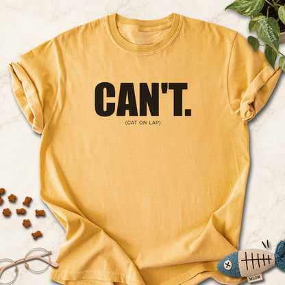 Mustard colored Comfort Colors 1717 cotton T-shirt, featuring a "Can't. (cat on lap)" funny cat design illustration. One Meow Two Souls brand.