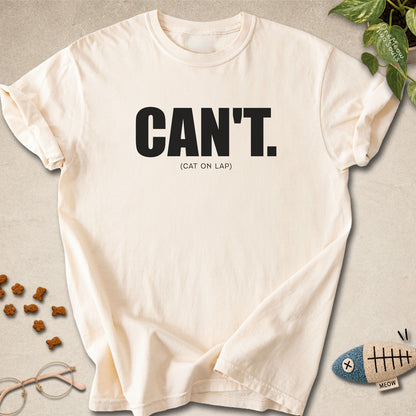 Ivory colored Comfort Colors 1717 cotton T-shirt, featuring a "Can't. (cat on lap)" funny cat design illustration. One Meow Two Souls brand.