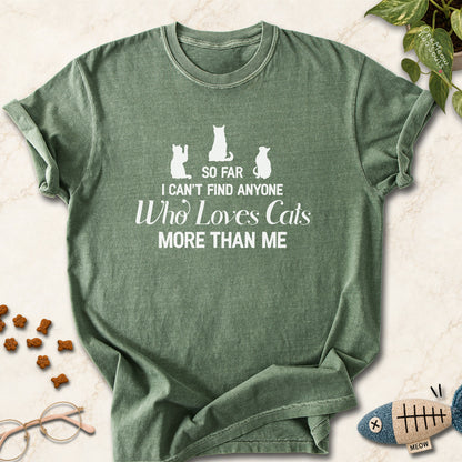 Moss colored Comfort Colors 1717 cotton T-shirt, featuring a "So I can't find anyone who loves cats more than me" funny cat design illustration. One Meow Two Souls brand.