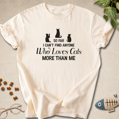 Ivory colored Comfort Colors 1717 cotton T-shirt, featuring a "So I can't find anyone who loves cats more than me" funny cat design illustration. One Meow Two Souls brand.