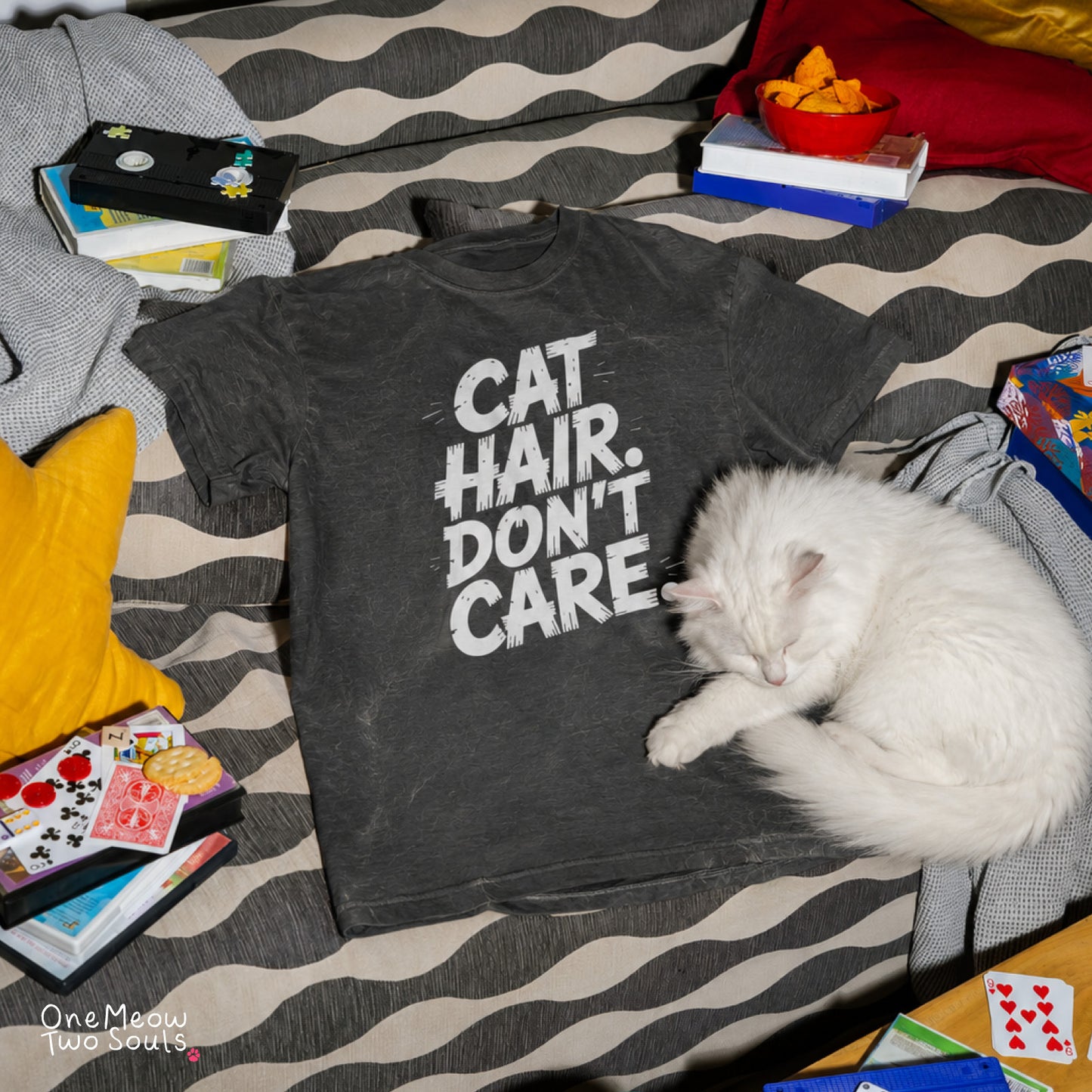 Pepper colored Comfort Colors 1717 cotton T-shirt, featuring a "Cat Hair Don't Care" funny cat design illustration. One Meow Two Souls brand.