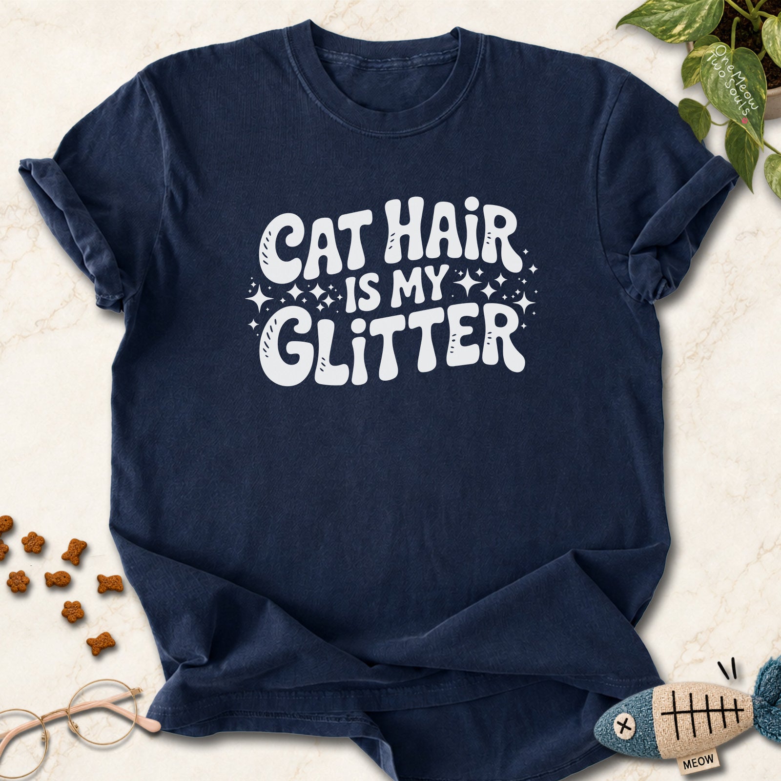 Navy colored Comfort Colors 1717 cotton T-shirt, featuring a "Cat Hair Is My Glitter" funny cat design illustration. One Meow Two Souls brand.