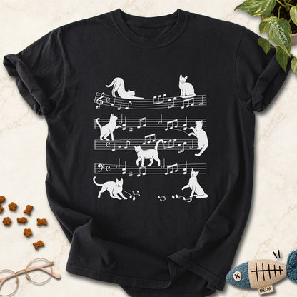 Black colored Comfort Colors 1717 cotton T-shirt, featuring a Cat music sheet funny cat design illustration. One Meow Two Souls brand.