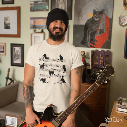 Ivory colored Comfort Colors 1717 cotton T-shirt, featuring a Cat music sheet funny cat design illustration. One Meow Two Souls brand.