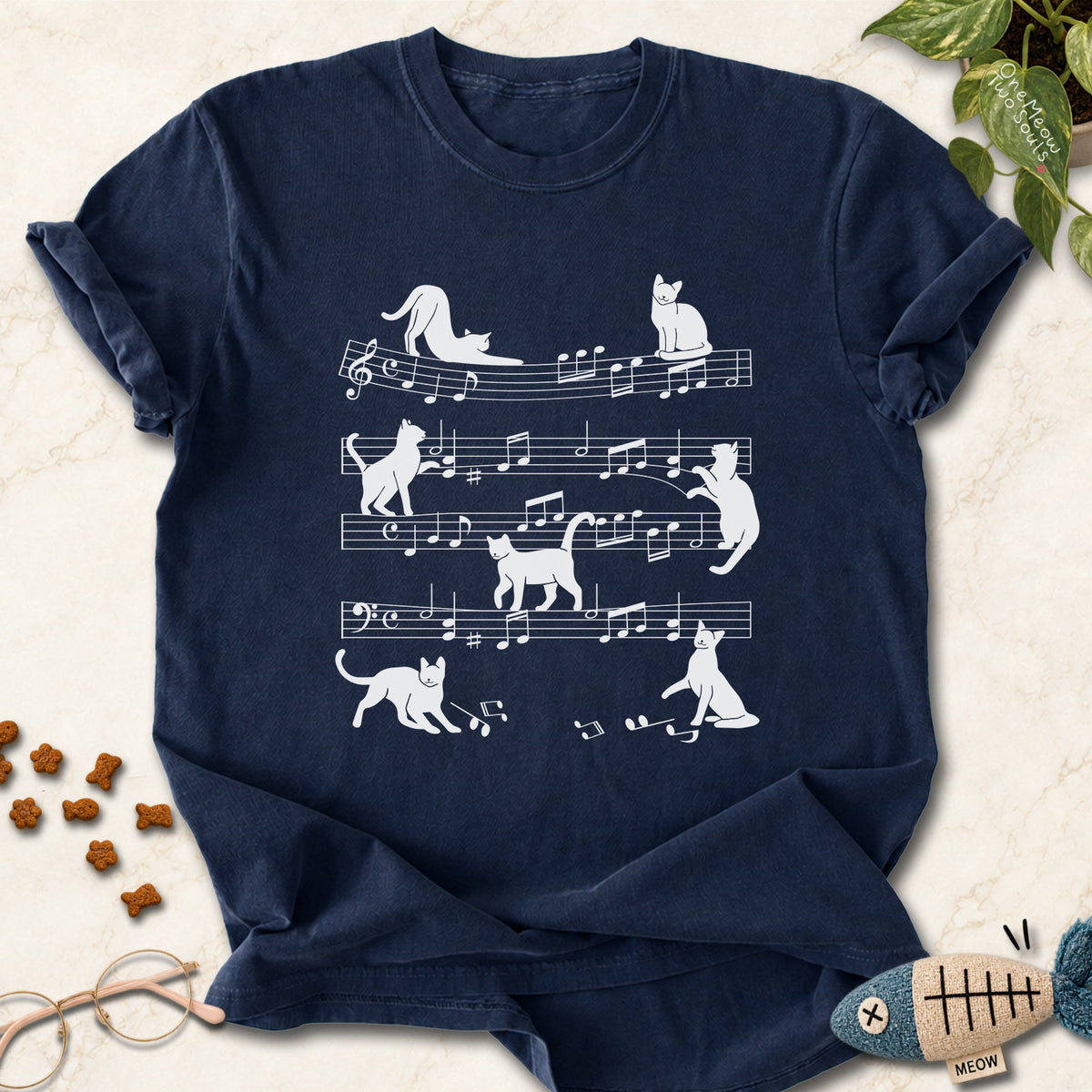 Navy colored Comfort Colors 1717 cotton T-shirt, featuring a Cat music sheet funny cat design illustration. One Meow Two Souls brand.