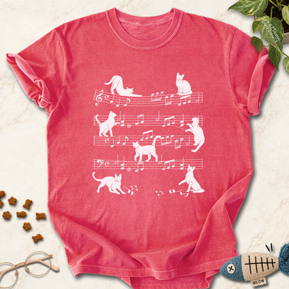 Watermelon colored Comfort Colors 1717 cotton T-shirt, featuring a Cat music sheet funny cat design illustration. One Meow Two Souls brand.