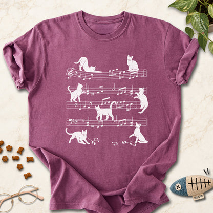 Berry colored Comfort Colors 1717 cotton T-shirt, featuring a Cat music sheet funny cat design illustration. One Meow Two Souls brand.