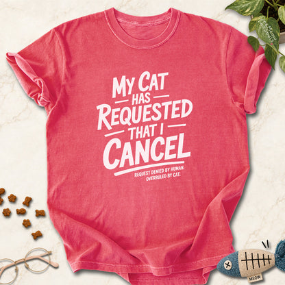 Watermelon colored Comfort Colors 1717 cotton T-shirt, featuring a "My Cat Has Requested That I Cancel" funny cat design illustration. One Meow Two Souls brand.