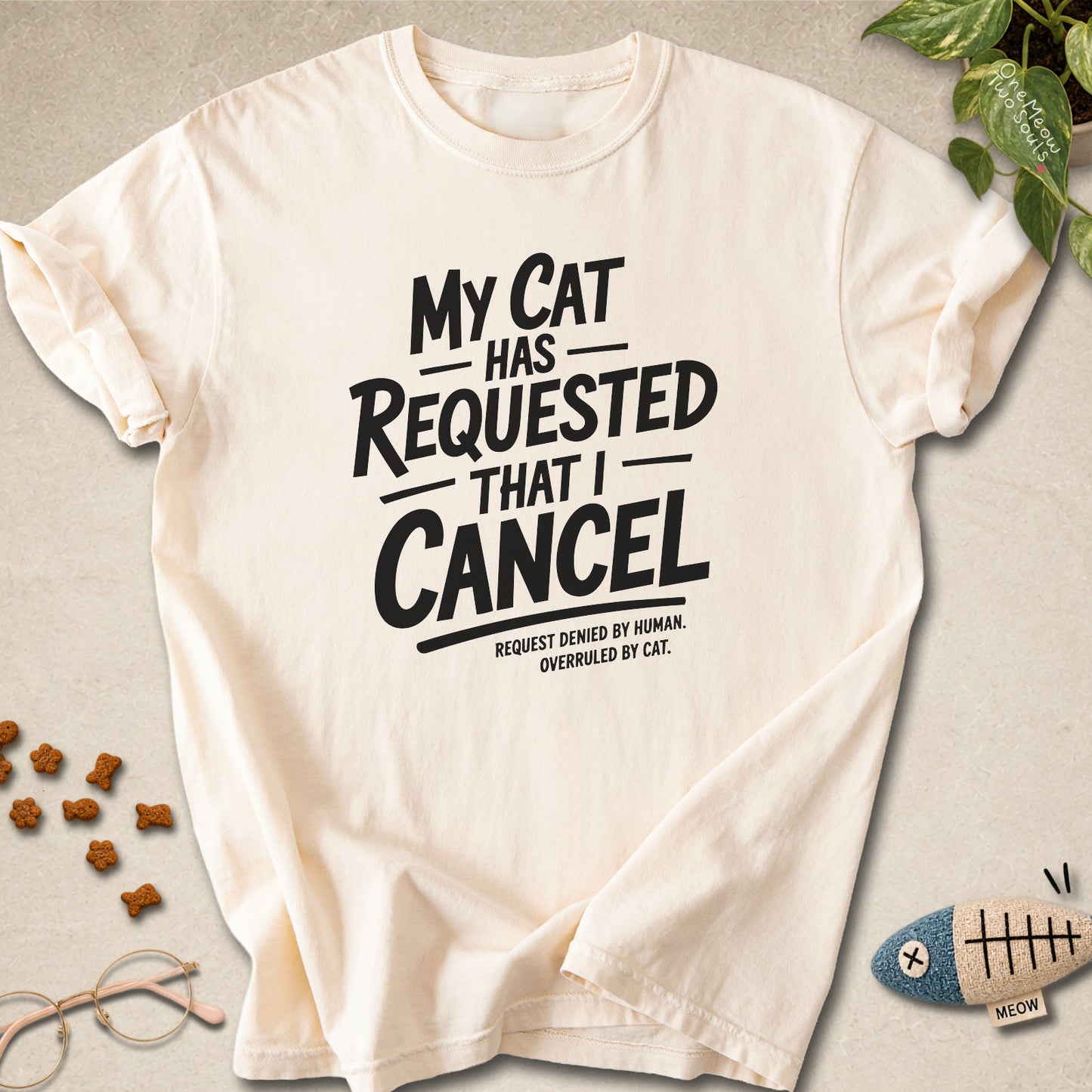 Ivory colored Comfort Colors 1717 cotton T-shirt, featuring a "My Cat Has Requested That I Cancel" funny cat design illustration. One Meow Two Souls brand.