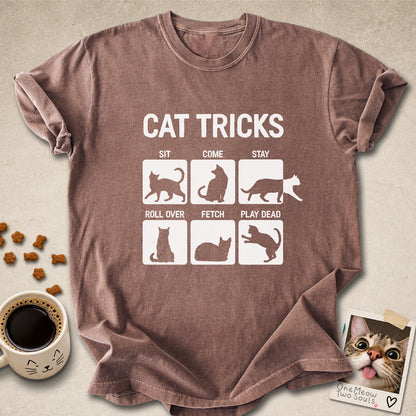 Espresso colored Comfort Colors 1717 cotton T-shirt, featuring a "Cat Tricks" funny cat design illustration. One Meow Two Souls brand.