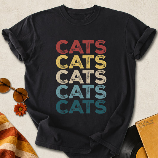 Black colored Comfort Colors 1717 cotton T-shirt, featuring a retro "CATS" cool cat design illustration. One Meow Two Souls brand.