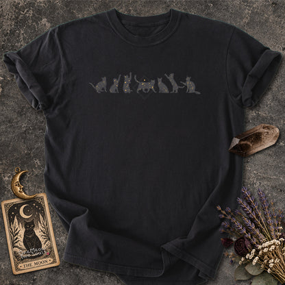 Black colored Comfort Colors 1717 cotton T-shirt, featuring a Celestial Cats witchy cat design illustration. One Meow Two Souls brand.