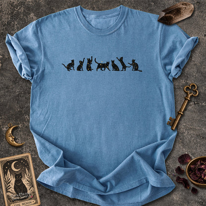 Blue Jean colored Comfort Colors 1717 cotton T-shirt, featuring a Celestial Cats witchy cat design illustration. One Meow Two Souls brand.