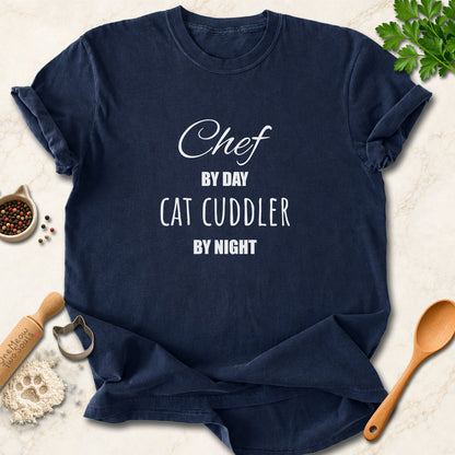 Navy colored Comfort Colors 1717 cotton T-shirt, featuring a "Chef by day, cat cuddler by night" funny cat design illustration. One Meow Two Souls brand.