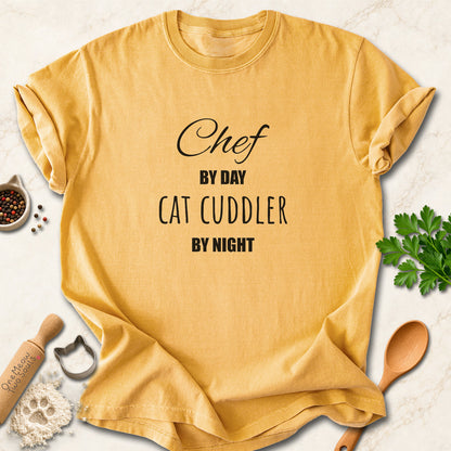 Mustard colored Comfort Colors 1717 cotton T-shirt, featuring a "Chef by day, cat cuddler by night" funny cat design illustration. One Meow Two Souls brand.