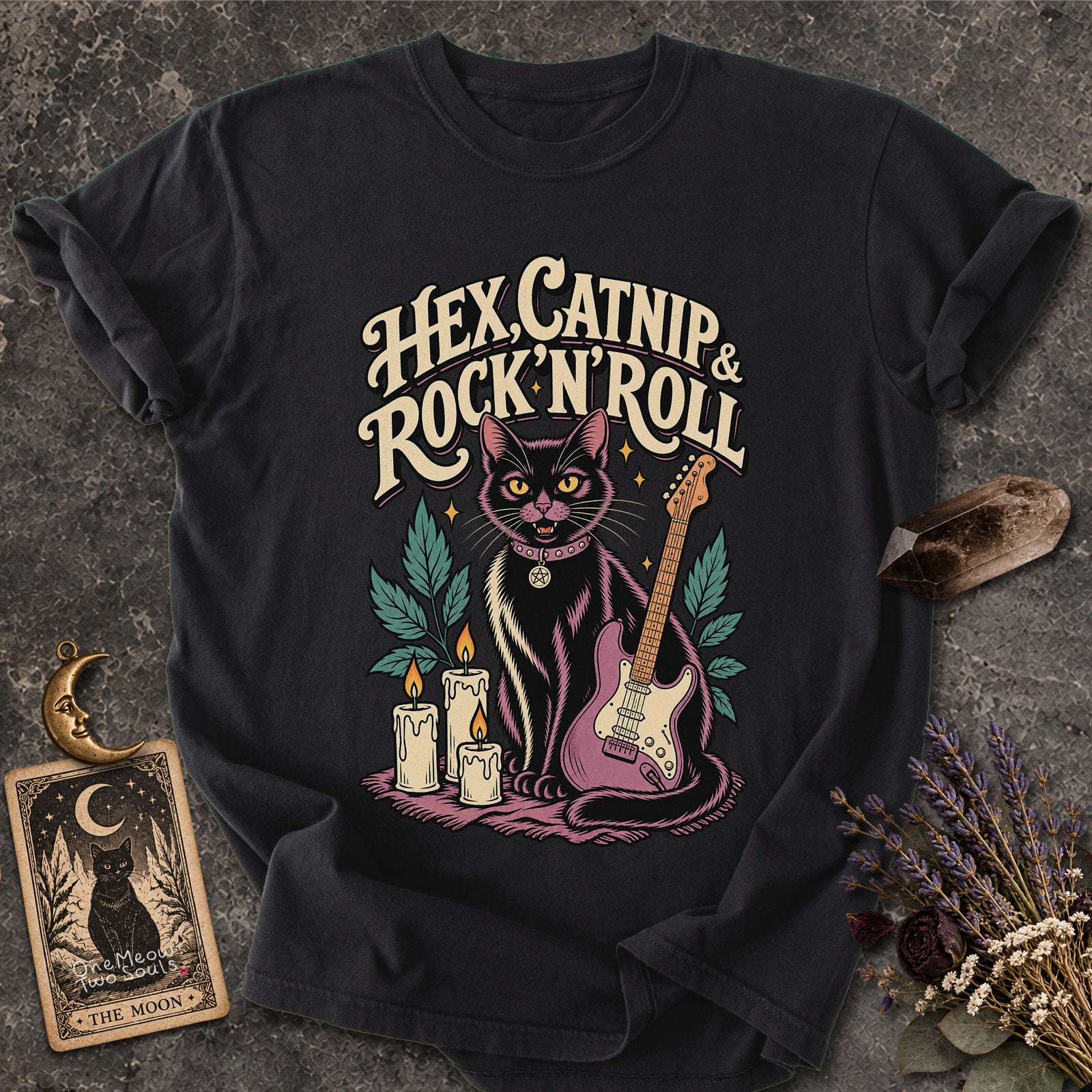 Black colored Comfort Colors 1717 cotton T-shirt, featuring a "Hex, catnip and Rock n roll" gothic witchy cat design illustration. One Meow Two Souls brand.