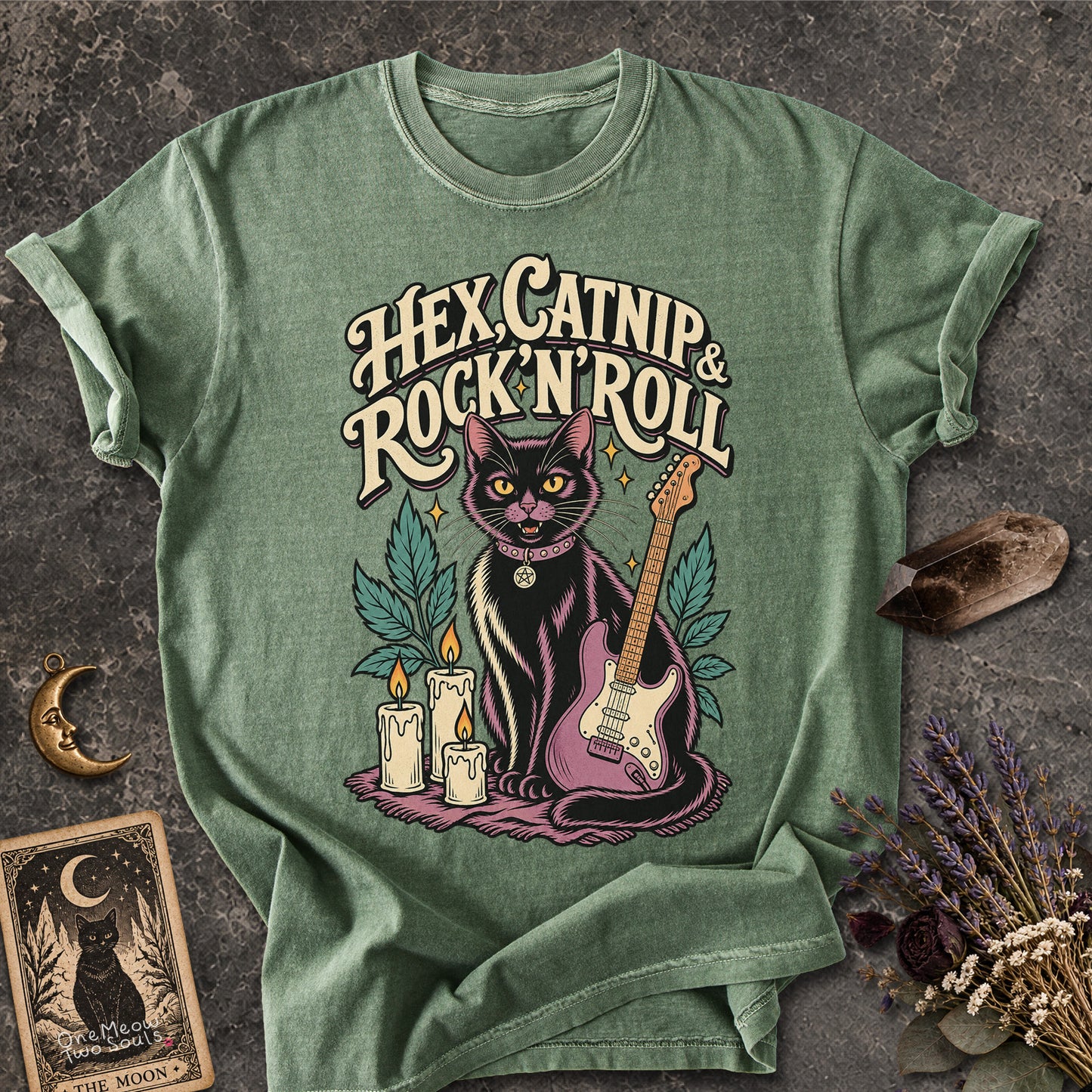 Moss colored Comfort Colors 1717 cotton T-shirt, featuring a "Hex, catnip and Rock n roll" gothic witchy cat design illustration. One Meow Two Souls brand.