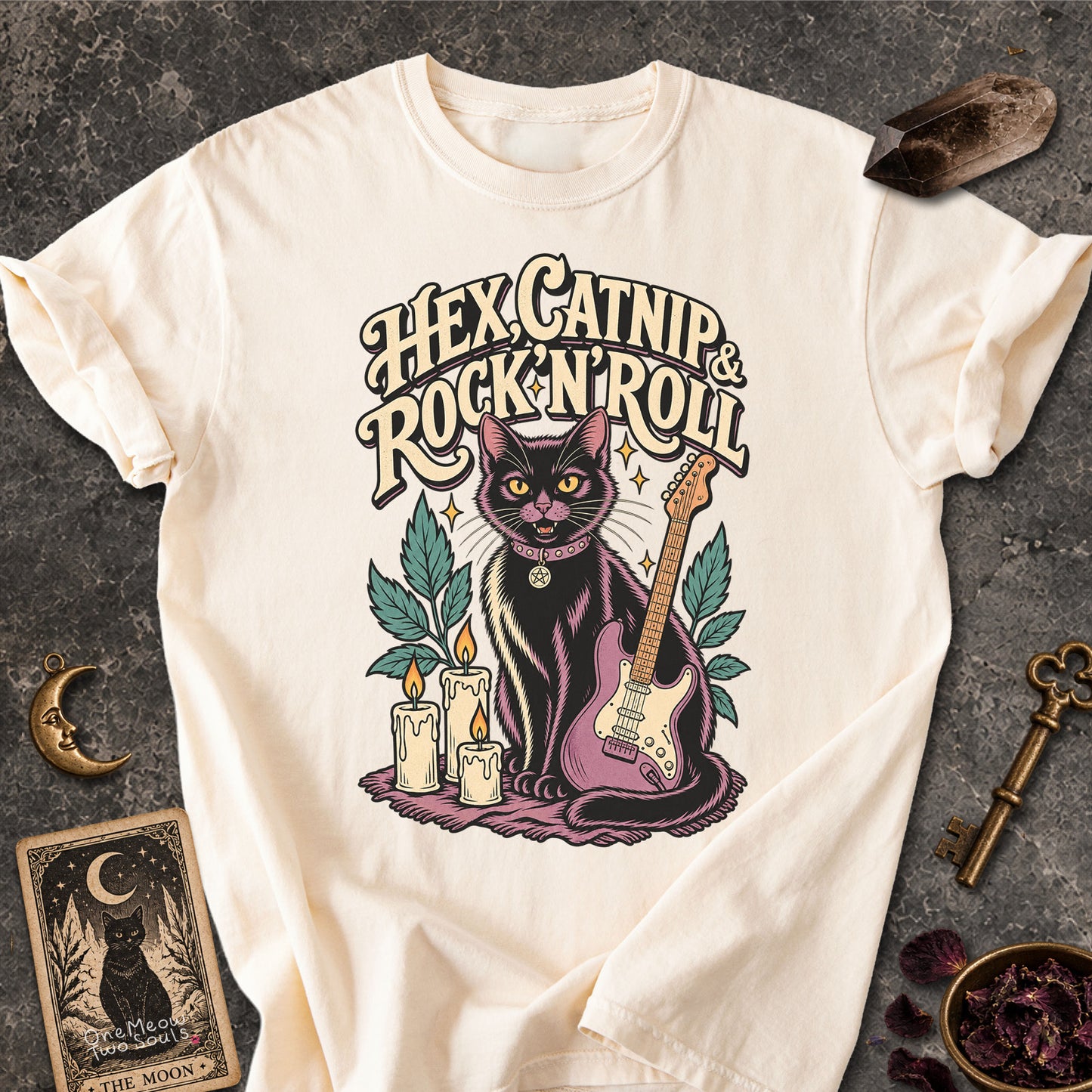 Ivory colored Comfort Colors 1717 cotton T-shirt, featuring a "Hex, catnip and Rock n roll" gothic witchy cat design illustration. One Meow Two Souls brand.