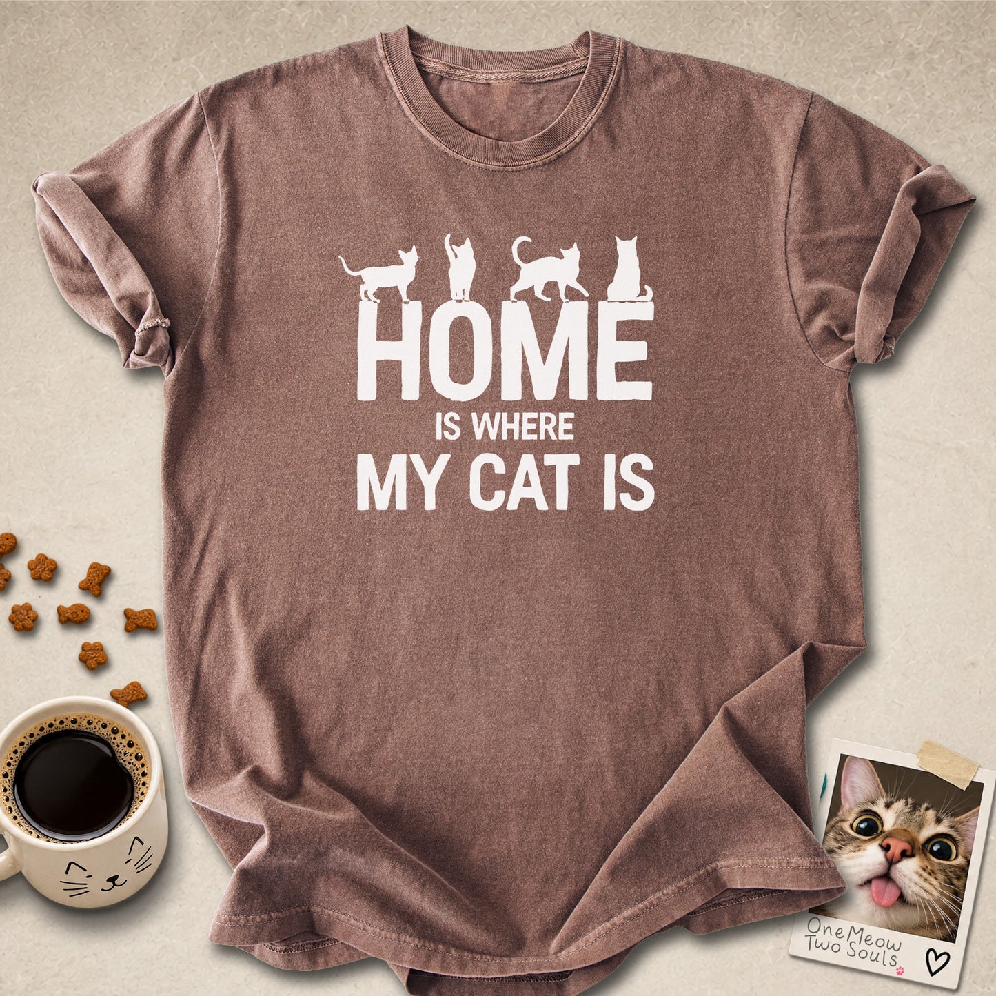 Espresso colored Comfort Colors 1717 cotton T-shirt, featuring a "Home is Where My Cat Is" funny cat design illustration. One Meow Two Souls brand.