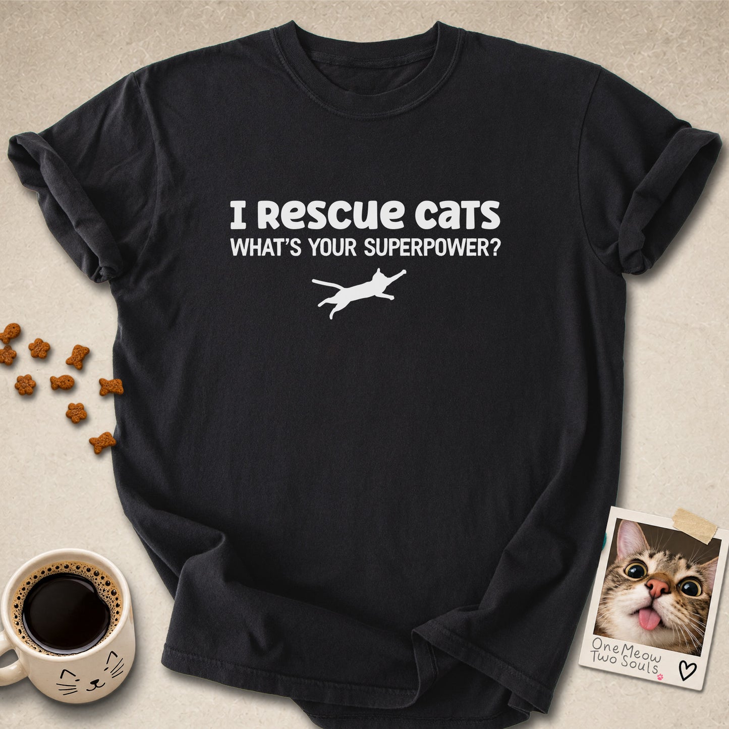 Black colored Comfort Colors 1717 cotton T-shirt, featuring a "I Rescue cats. What is your superpower?" funny cat design illustration. One Meow Two Souls brand.