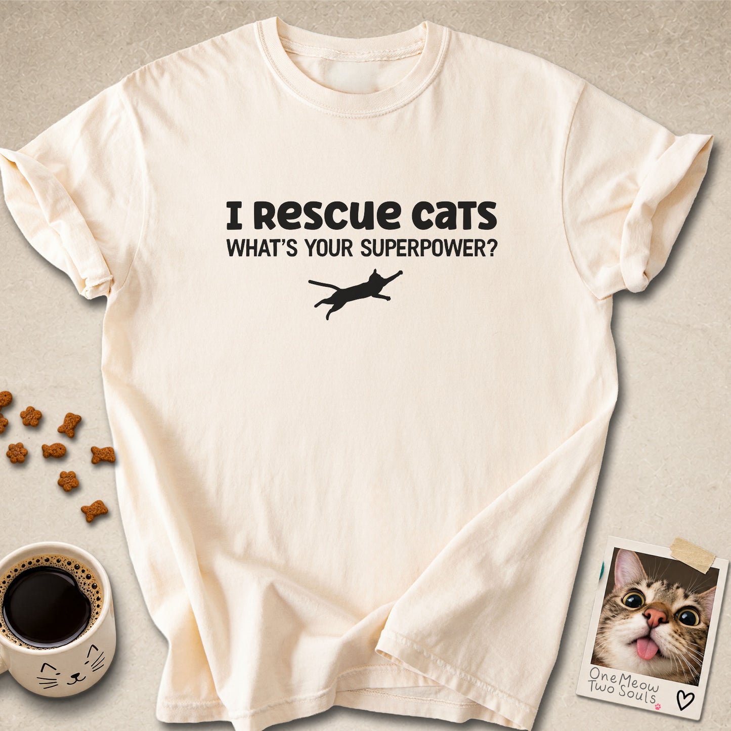 Ivory colored Comfort Colors 1717 cotton T-shirt, featuring a "I Rescue cats. What is your superpower?" funny cat design illustration. One Meow Two Souls brand.