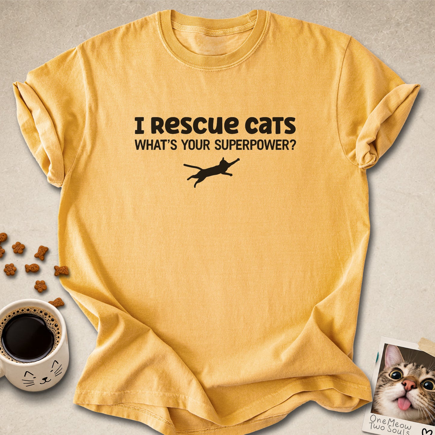 Mustard colored Comfort Colors 1717 cotton T-shirt, featuring a "I Rescue cats. What is your superpower?" funny cat design illustration. One Meow Two Souls brand.