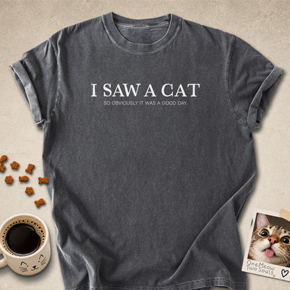Pepper colored Comfort Colors 1717 cotton T-shirt, featuring a "I saw a cat. So obviously it was a good day." funny cat design illustration. One Meow Two Souls brand.