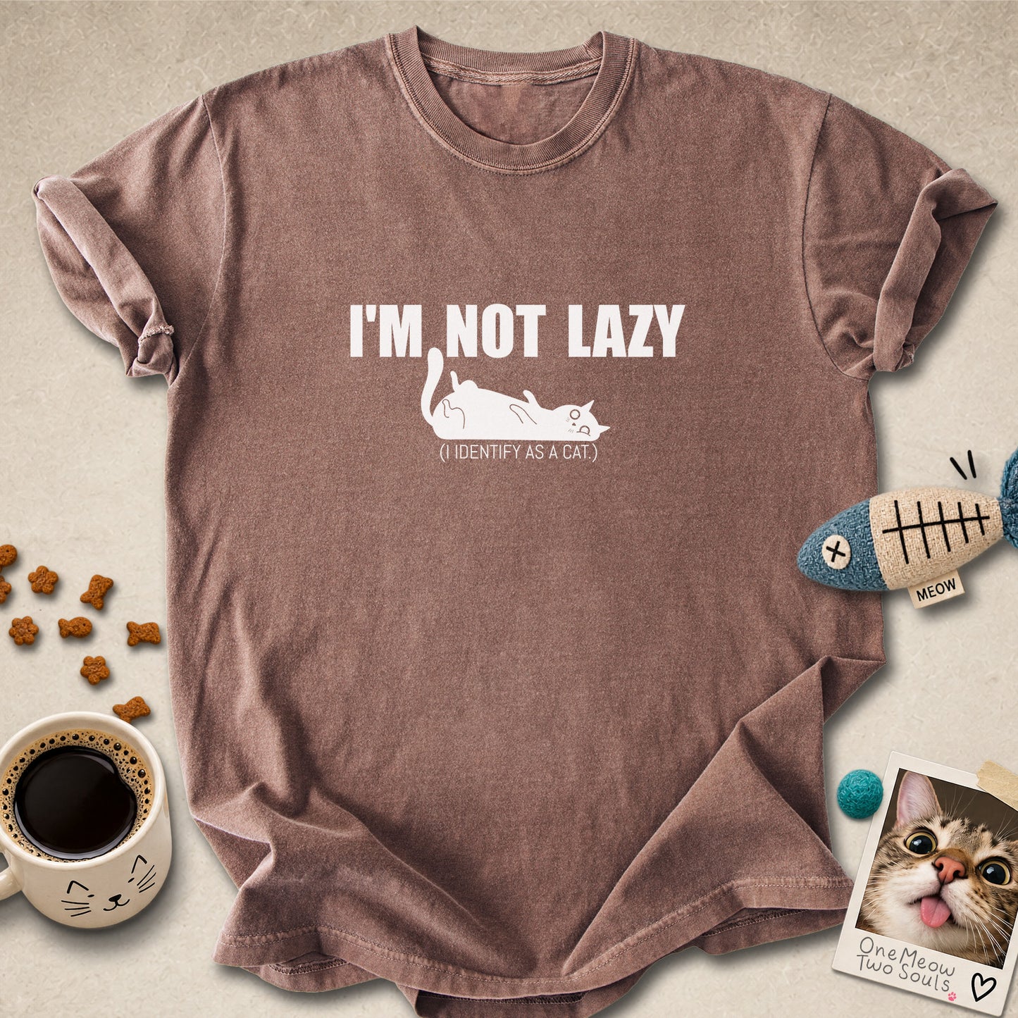 Espresso colored Comfort Colors 1717 cotton T-shirt, featuring a "I'm not lazy, I identify as a cat" funny cat design illustration. One Meow Two Souls brand.