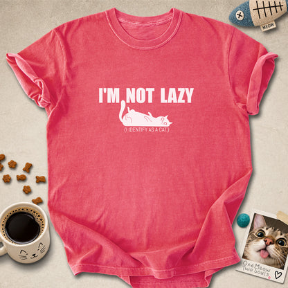 Watermelon colored Comfort Colors 1717 cotton T-shirt, featuring a "I'm not lazy, I identify as a cat" funny cat design illustration. One Meow Two Souls brand.