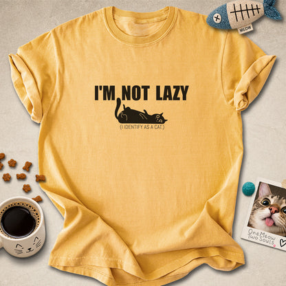 Mustard colored Comfort Colors 1717 cotton T-shirt, featuring a "I'm not lazy, I identify as a cat" funny cat design illustration. One Meow Two Souls brand.