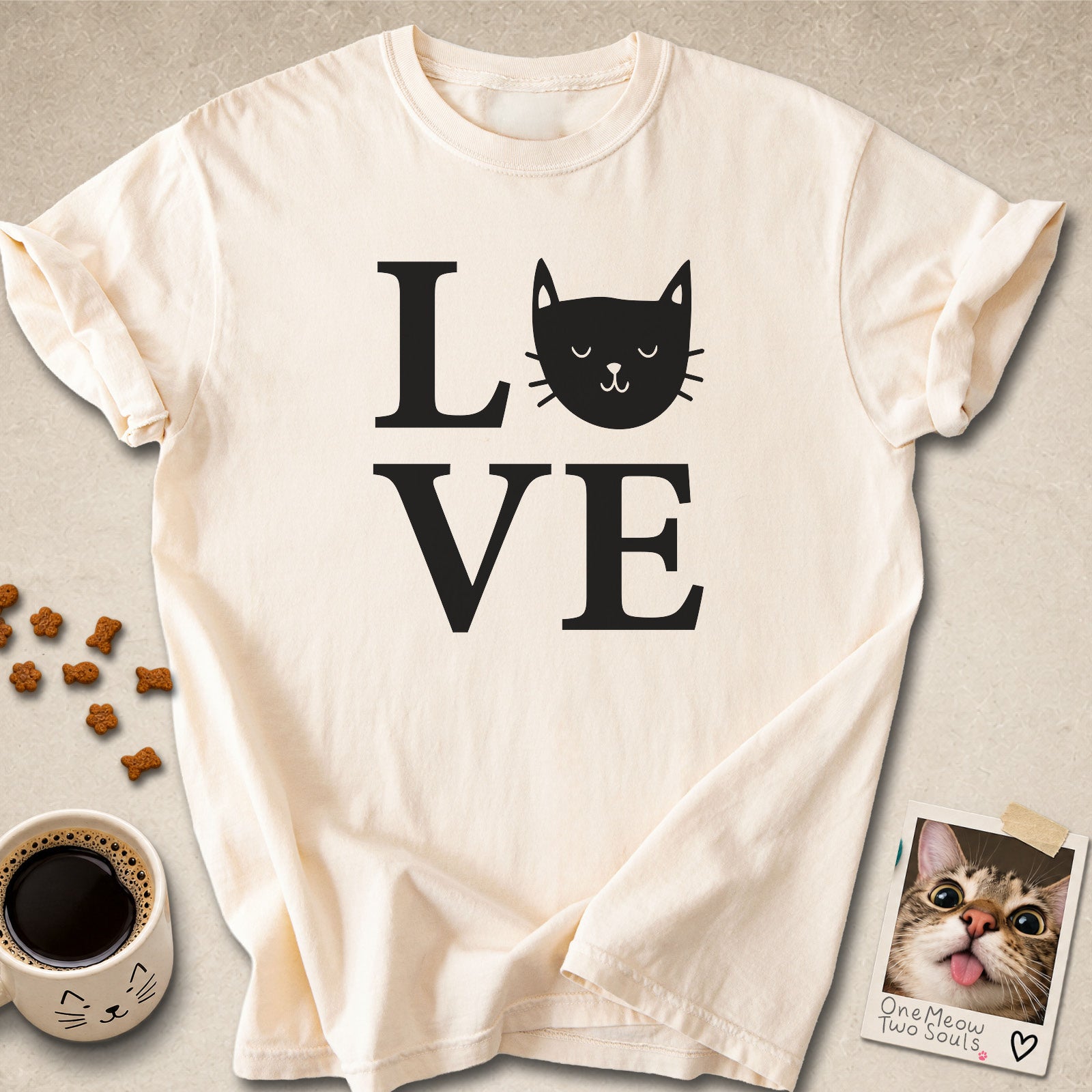 Ivory colored Comfort Colors 1717 cotton T-shirt, featuring a "LOVE" cute cat design illustration. One Meow Two Souls brand.