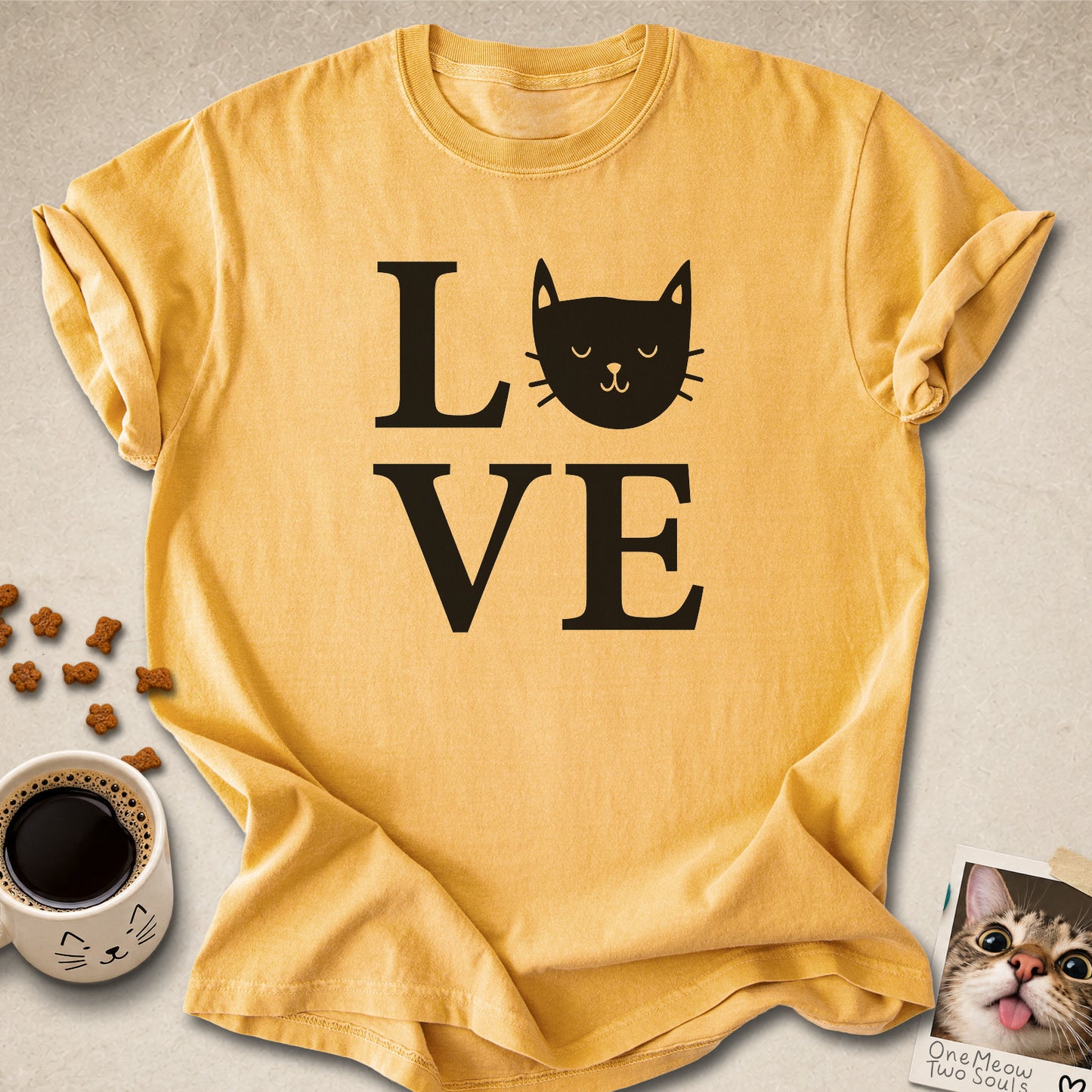 Mustard colored Comfort Colors 1717 cotton T-shirt, featuring a "LOVE" cute cat design illustration. One Meow Two Souls brand.