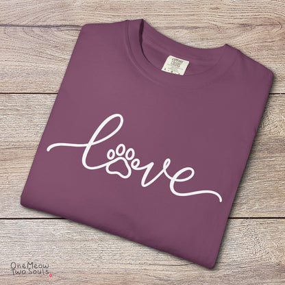 Berry  colored Comfort Colors 1717 cotton T-shirt, featuring a "LOVE" cat paw design illustration. One Meow Two Souls brand.