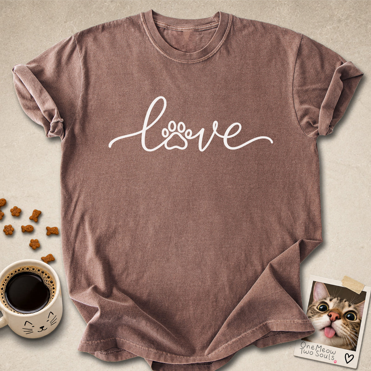 Espresso colored Comfort Colors 1717 cotton T-shirt, featuring a "LOVE" cat paw design illustration. One Meow Two Souls brand.