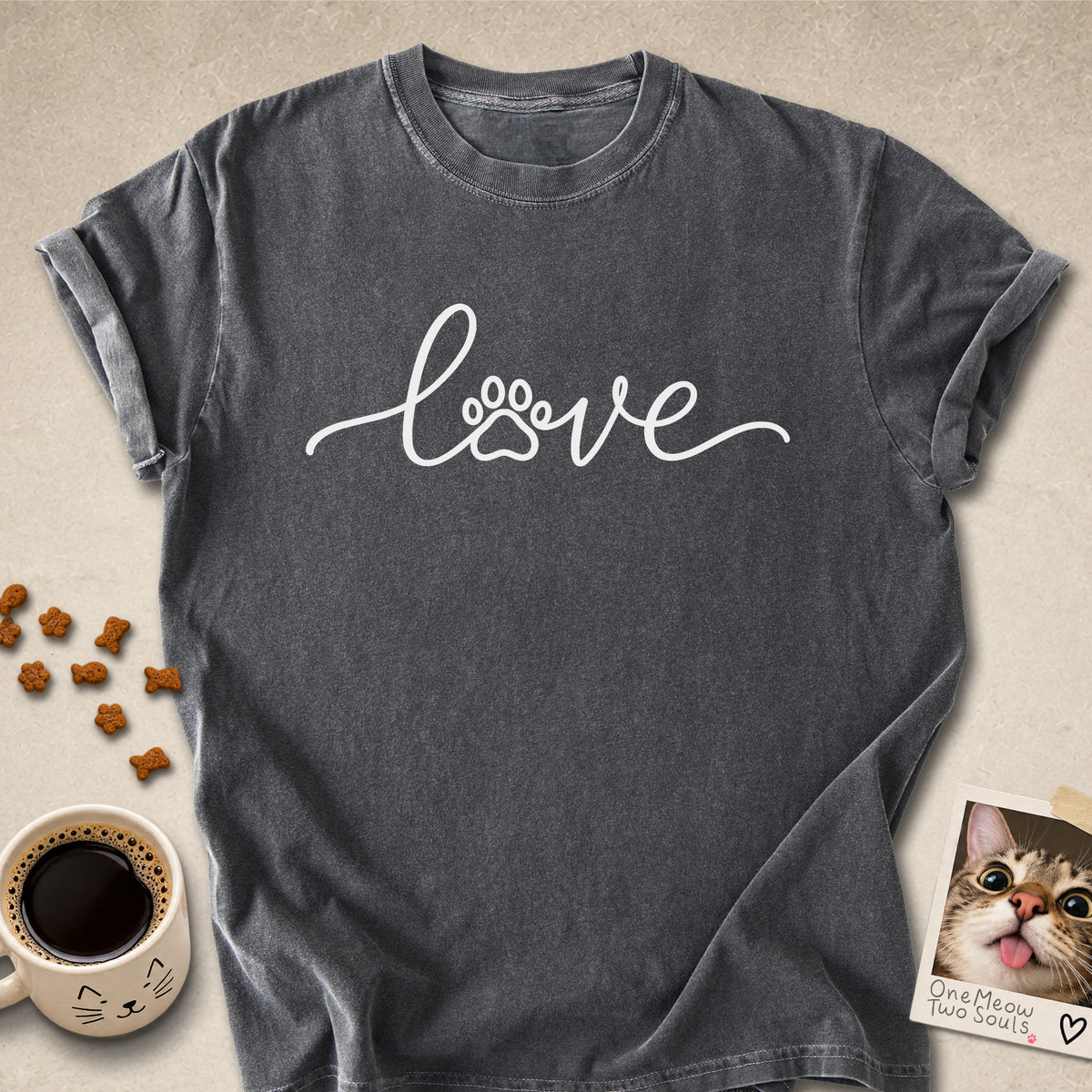 Pepper colored Comfort Colors 1717 cotton T-shirt, featuring a "LOVE" cat paw design illustration. One Meow Two Souls brand.