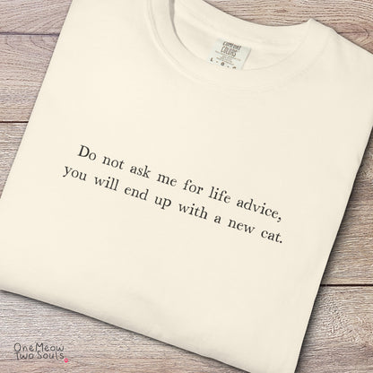 Ivory colored Comfort Colors 1717 cotton T-shirt, featuring a "Do not ask me for life advice, you will end up with a new cat." funny cat design illustration. One Meow Two Souls brand.